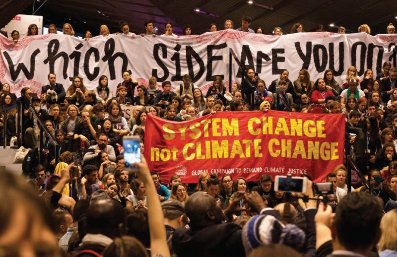 Protest Banner: Which side are you on? and System change not climate change